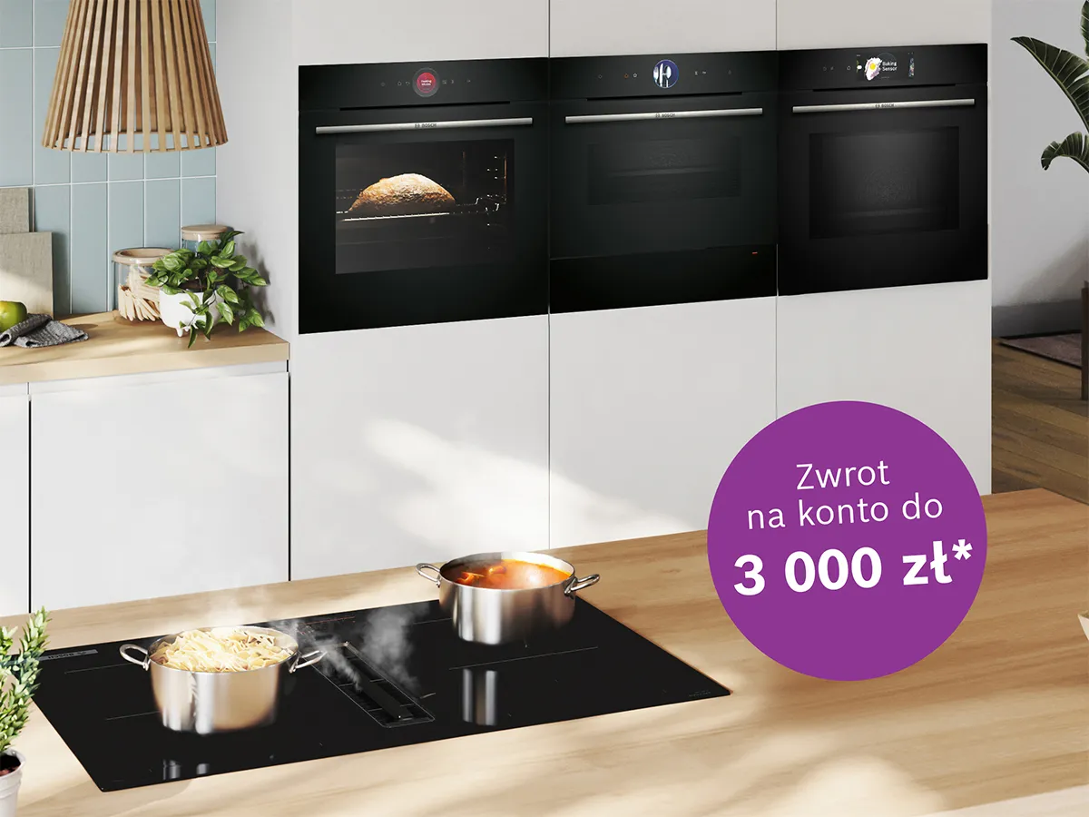 Płyta indukcyjna i piekarniki do zabudowy w jasnej kuchni