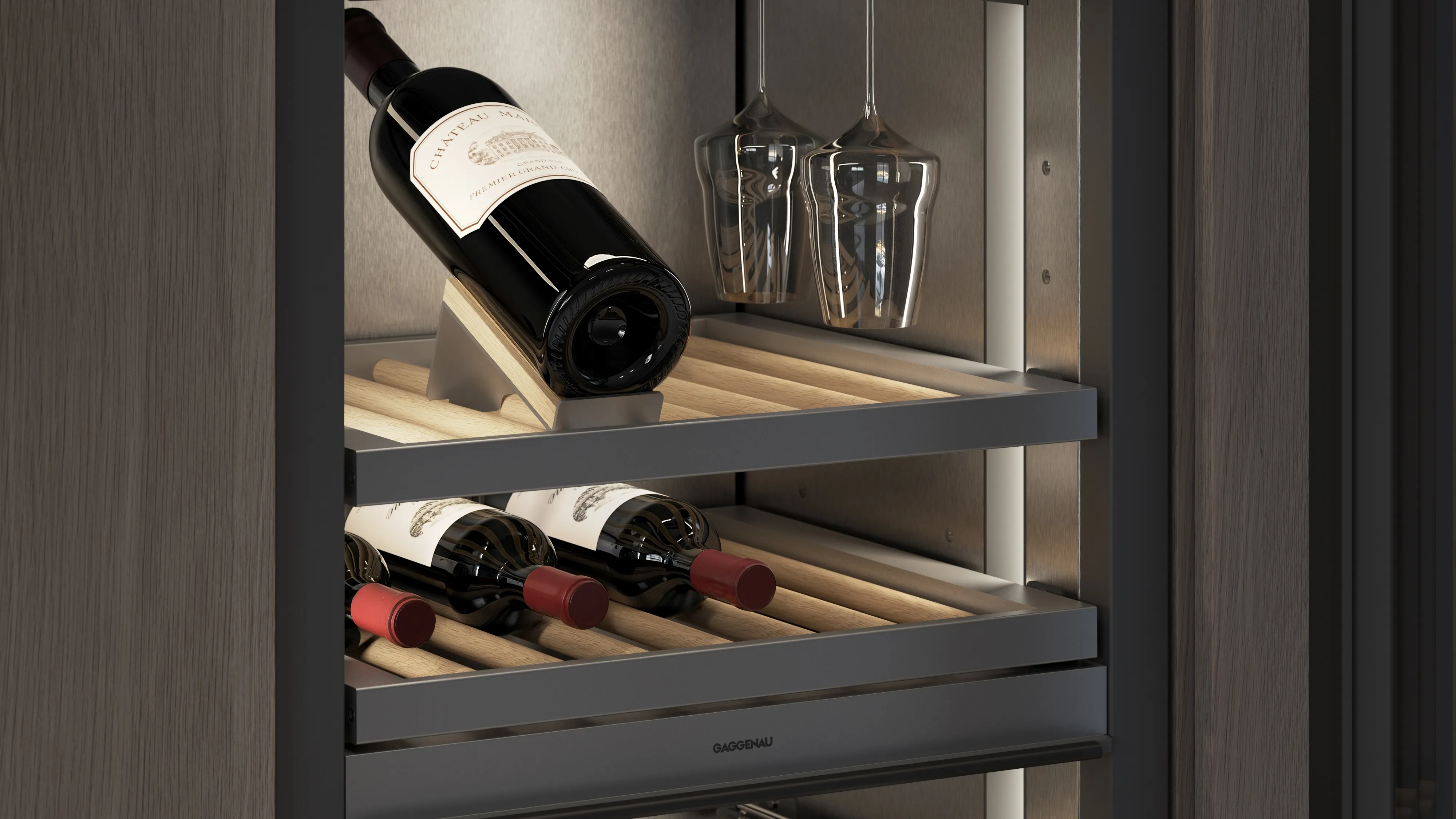 Close-up view of the dark brushed stainless steel interior and white oak bottle presenters featured in the Gaggenau Vario cooling expressive series wine climate cabinet