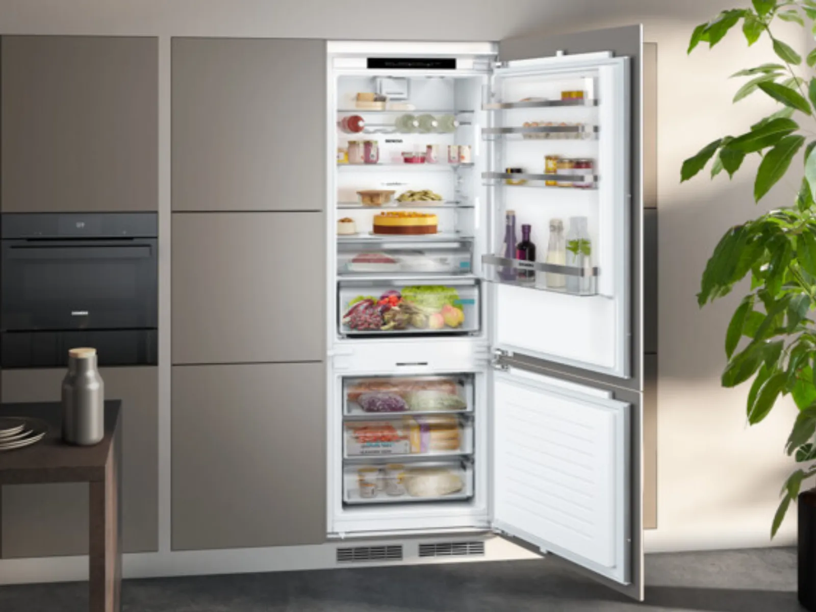 Built in fridge freezer with open door