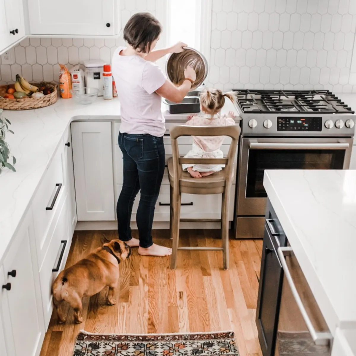 Hands shaping bread dough on a floured kitchen counter while preparing an easy homemade bread recipe