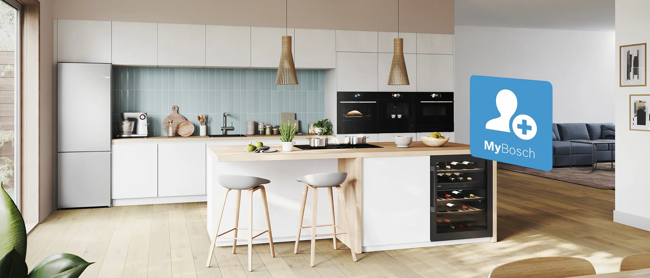 Cuisine moderne avec placards blancs, murs bleus, parquet et buanderie en arrière plan.