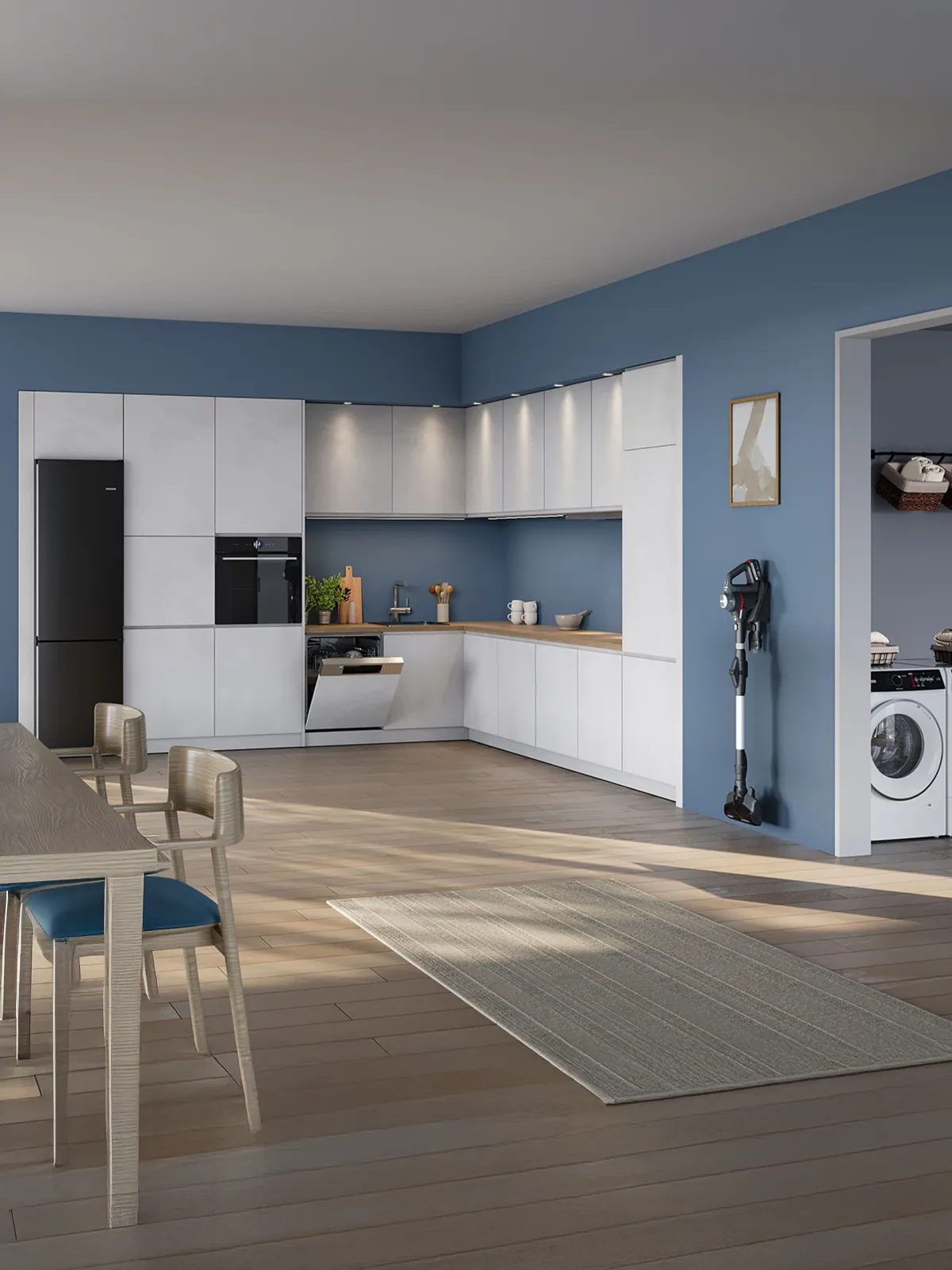 Moderne keuken met witte kasten, blauwe muren, houten vloer en een wasruimte op de achtergrond.