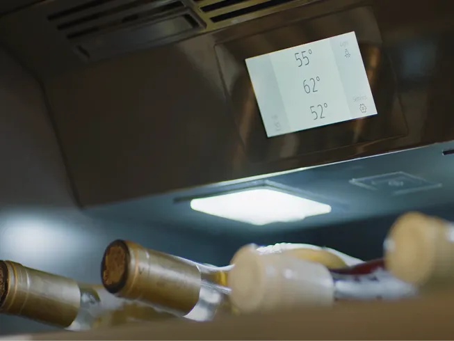 Bottles of wine inside a wine fridge