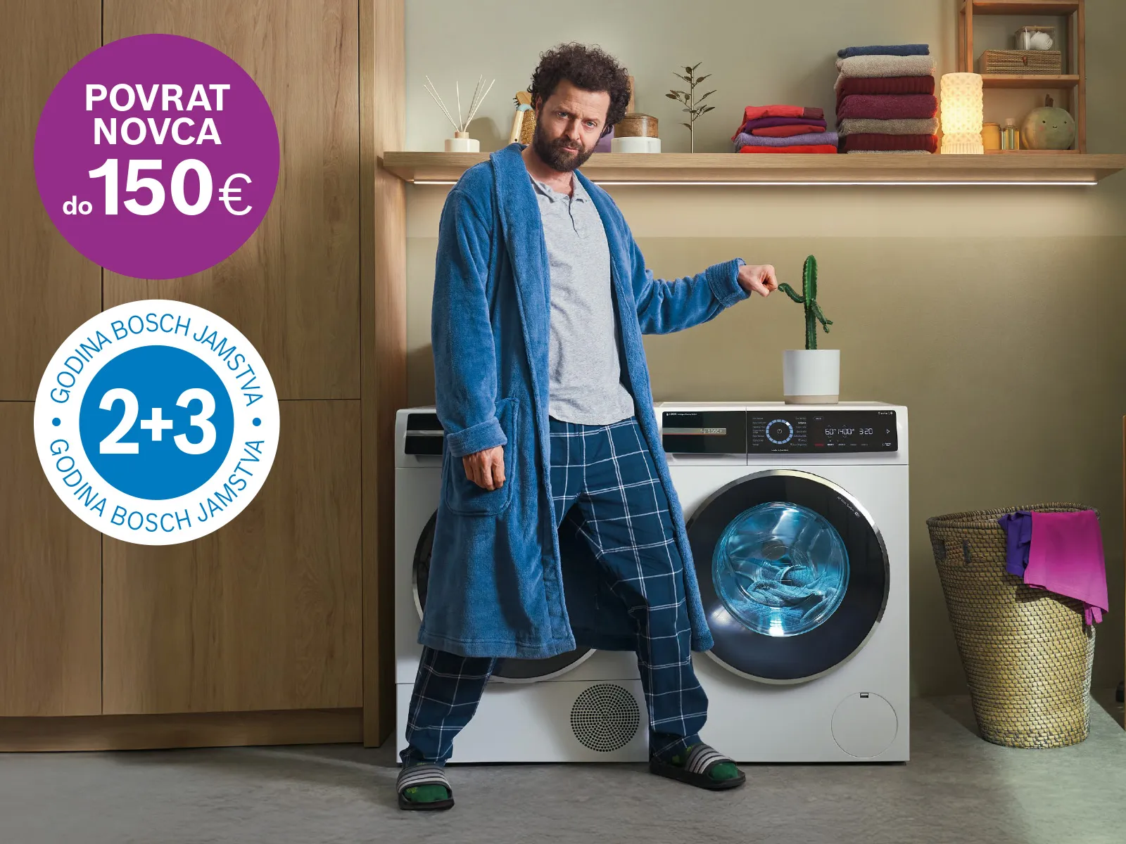 Muškarac stoji ispre perilice i žena stoji ispred hladnjaka