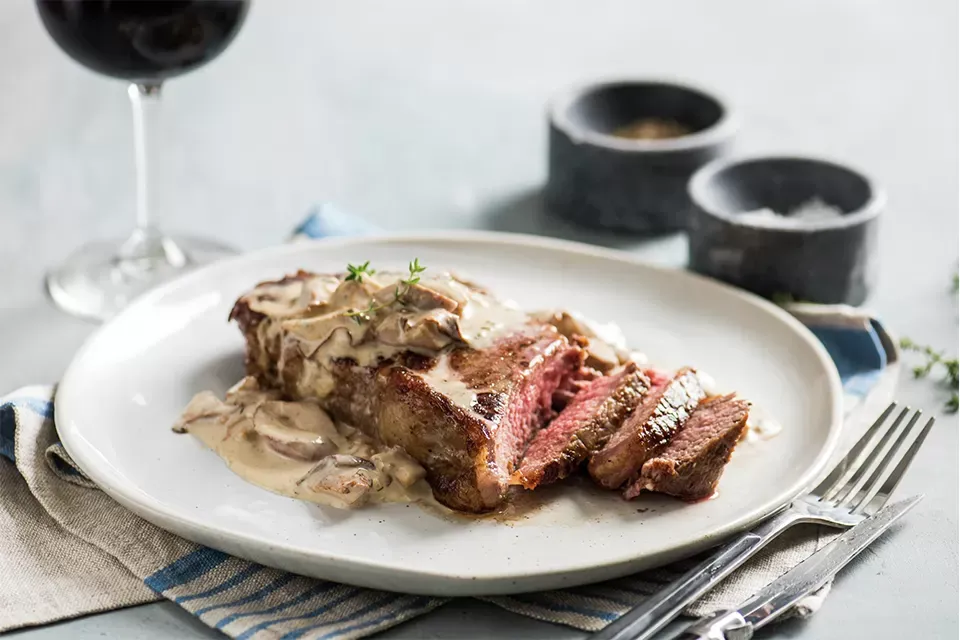 NY Strip Steak with Chanterelle Mushroom Cream Sauce