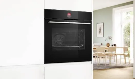 Stainless steel built-in oven with digital display and control panel.