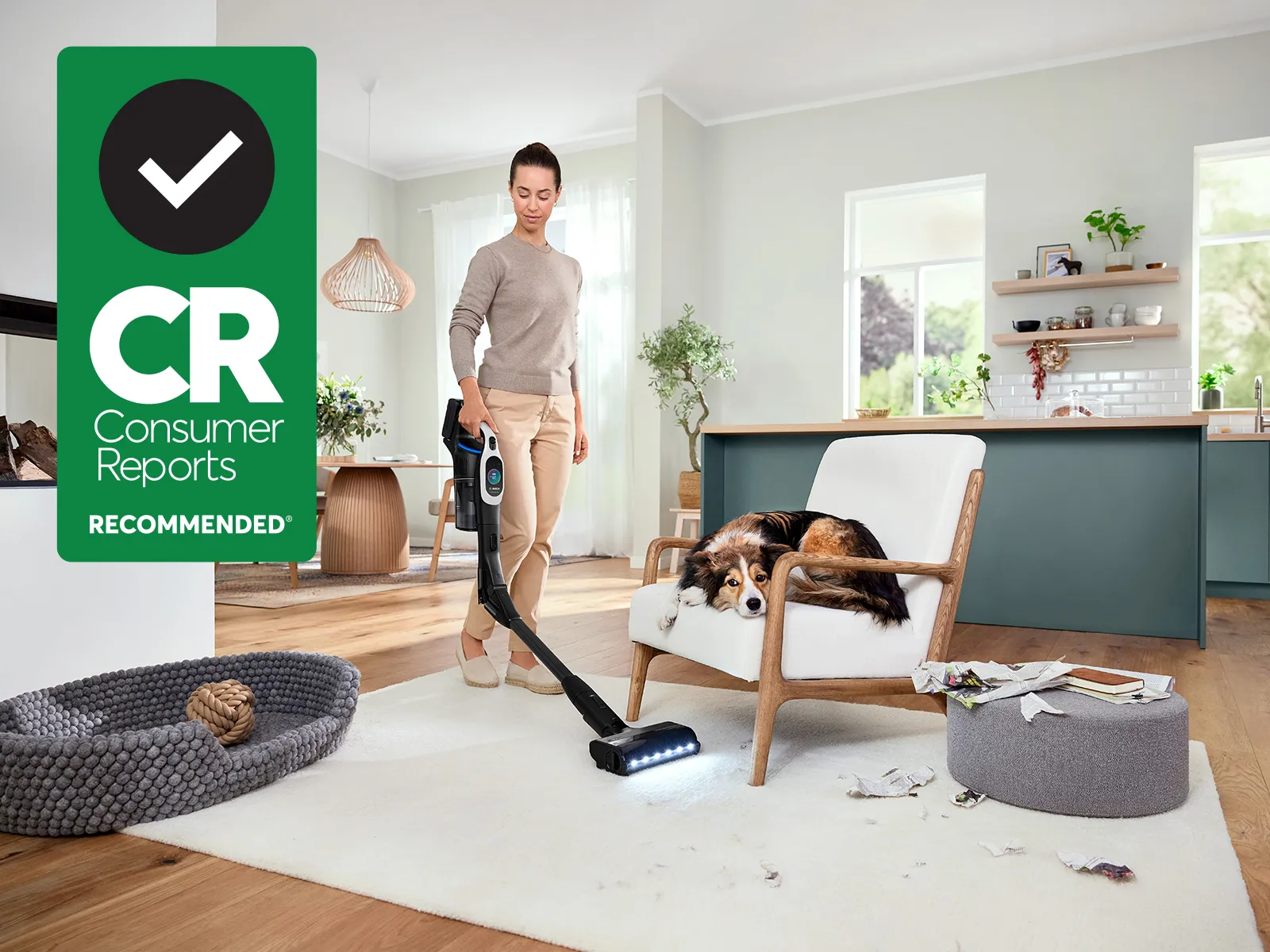 Consumer Reports Recommended badge with woman Vacuuming mess in living room