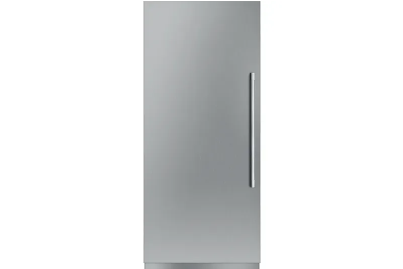 Tall stainless steel refrigerator with a vertical metal handle on the right side against a neutral background.