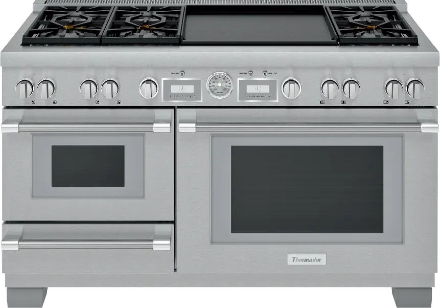 Stainless steel Thermador range with six burners, dual ovens, griddle, control knobs, and a central temperature gauge.