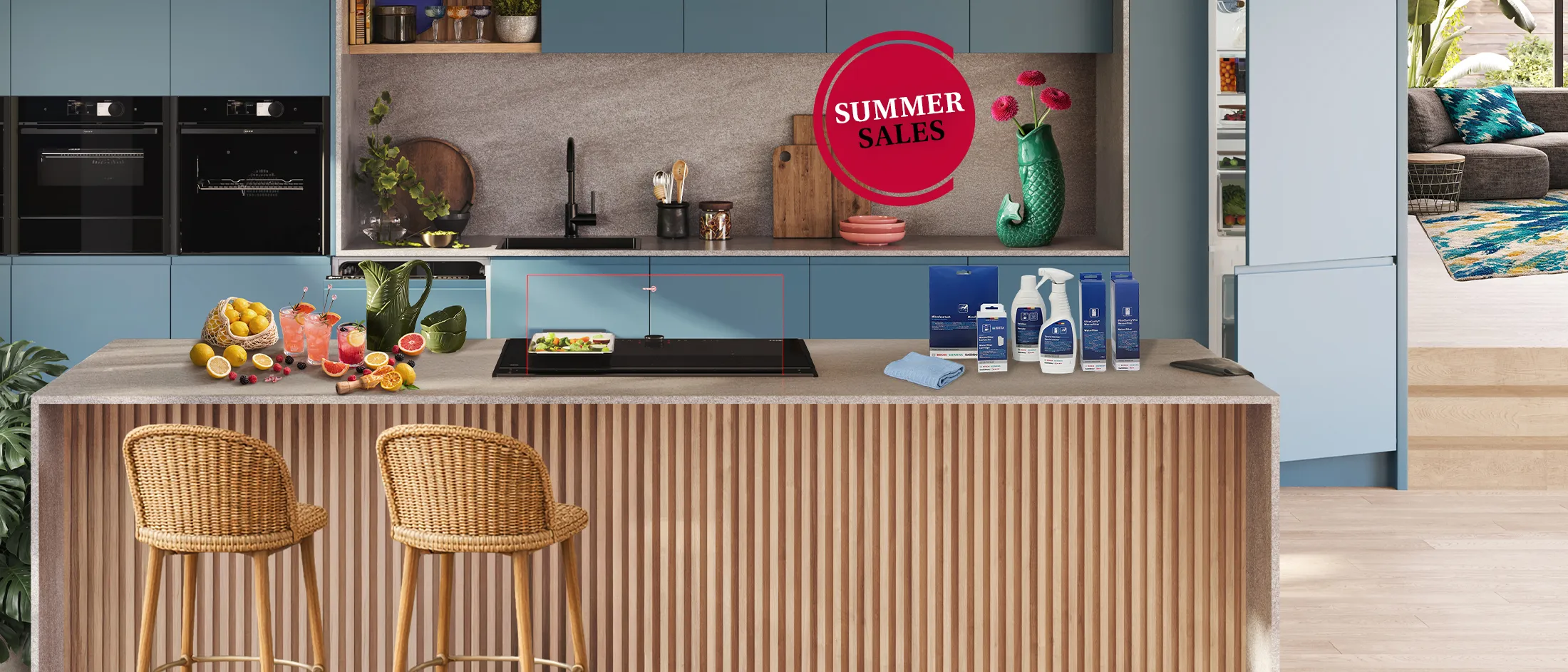 Kitchen counter with cleaning products, a green fish-shaped vase with red flowers, and a red "Summer Sales" badge on the side.