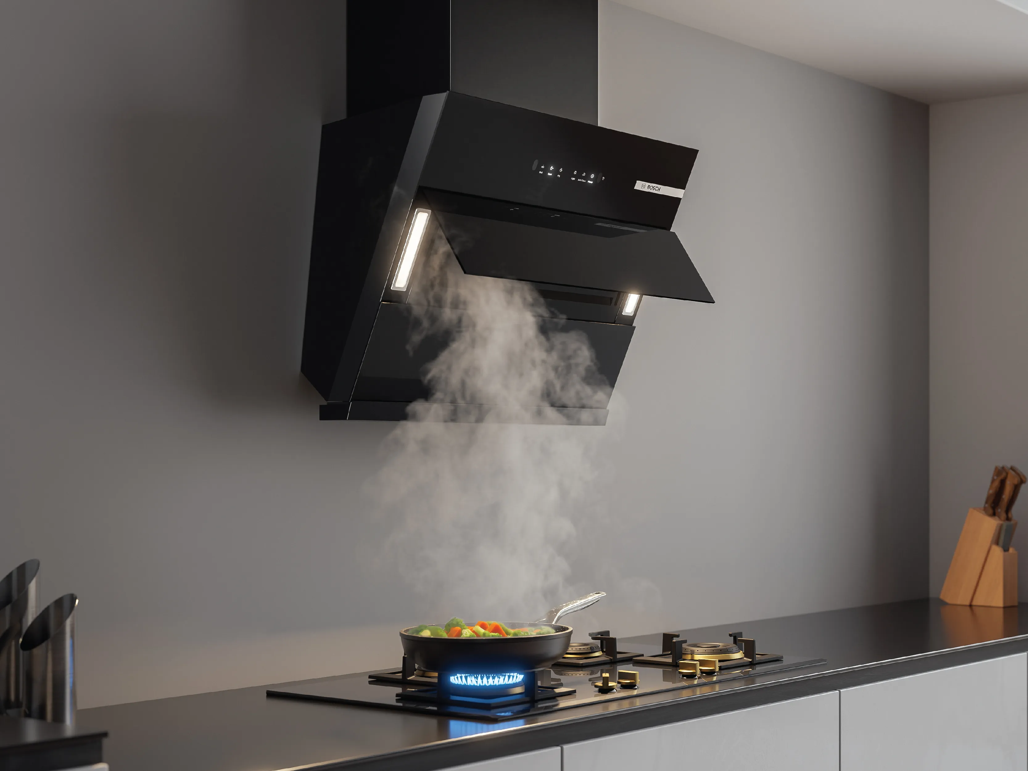 Modern kitchen featuring a sleek black wall-mounted range hood, minimalist cabinetry, and a countertop.