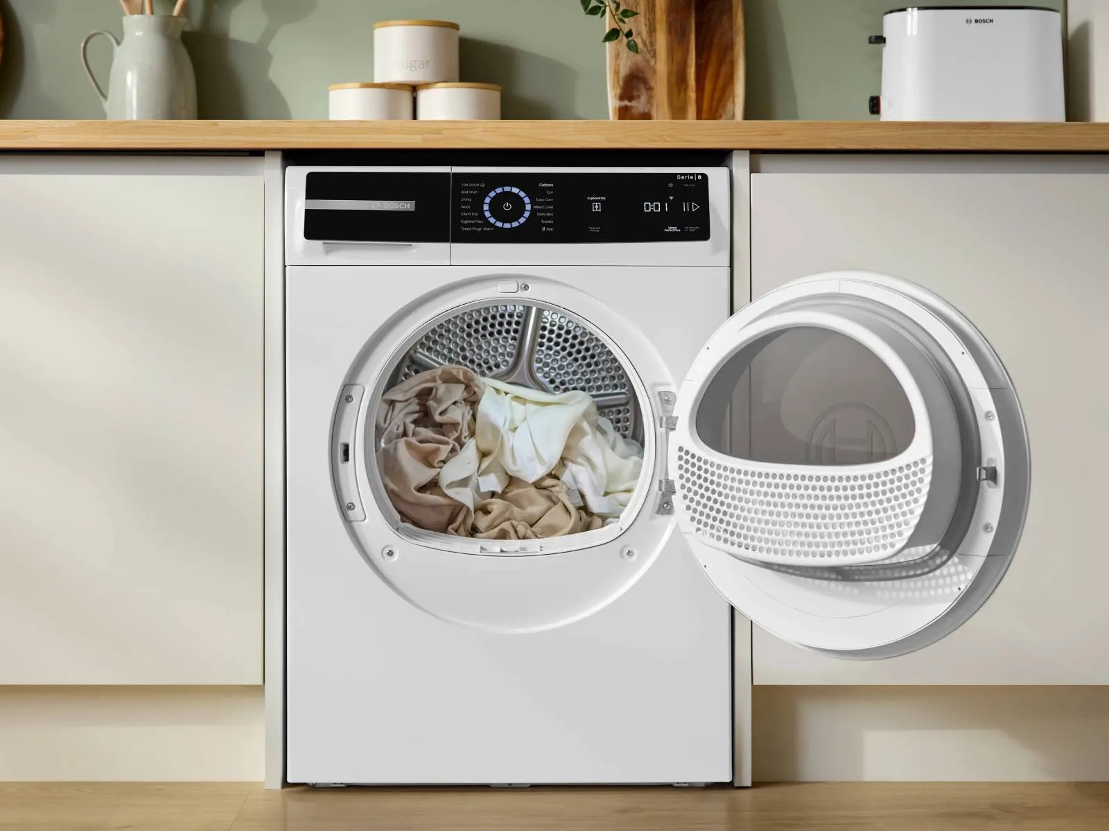 Heat pump dryer under counter with open door