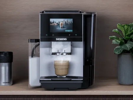 Fully automatic coffee machine EQ700 iAroma on a kitchen worktop.