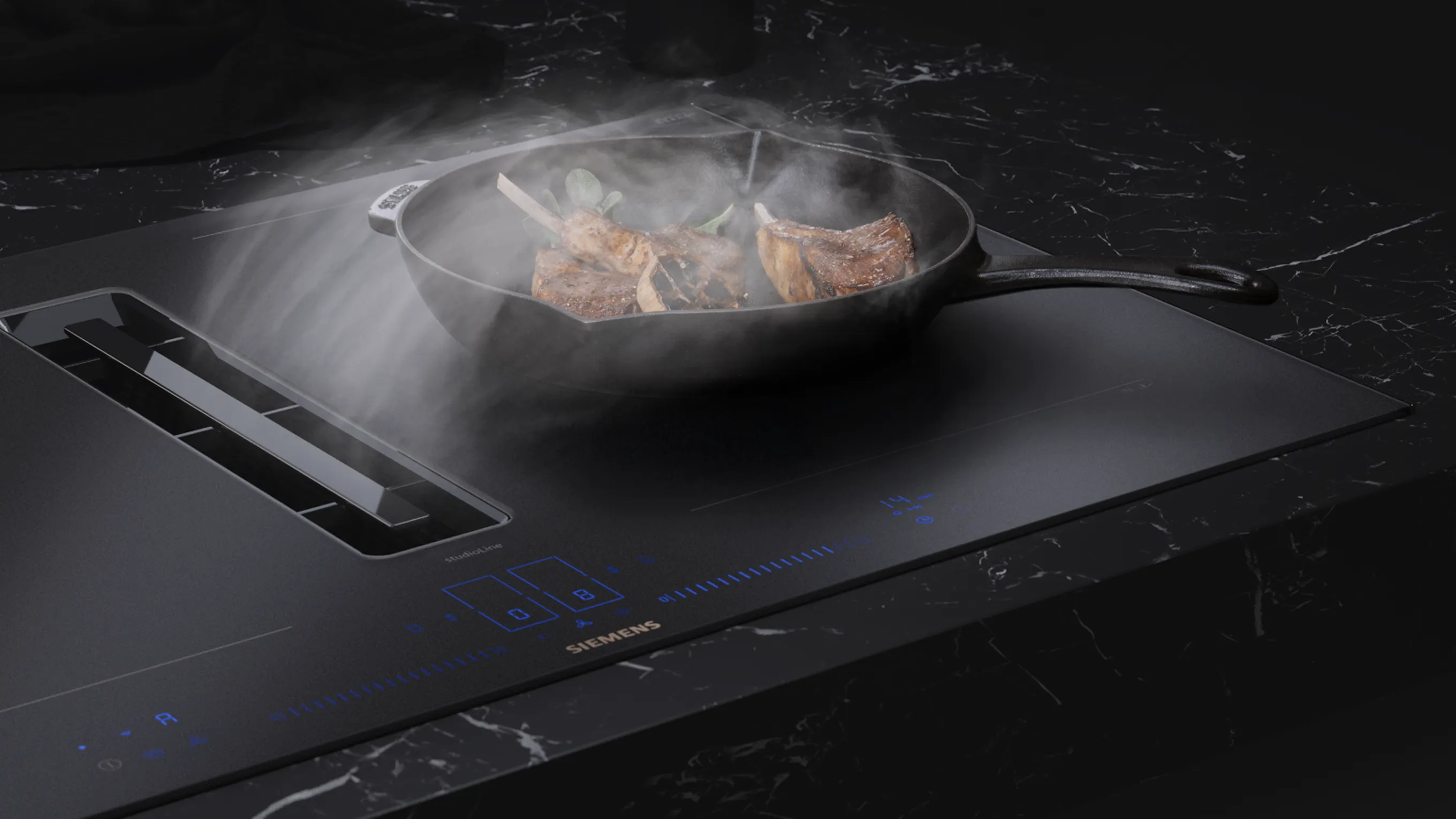 2 fours noirs et tactiles dans une cuisine