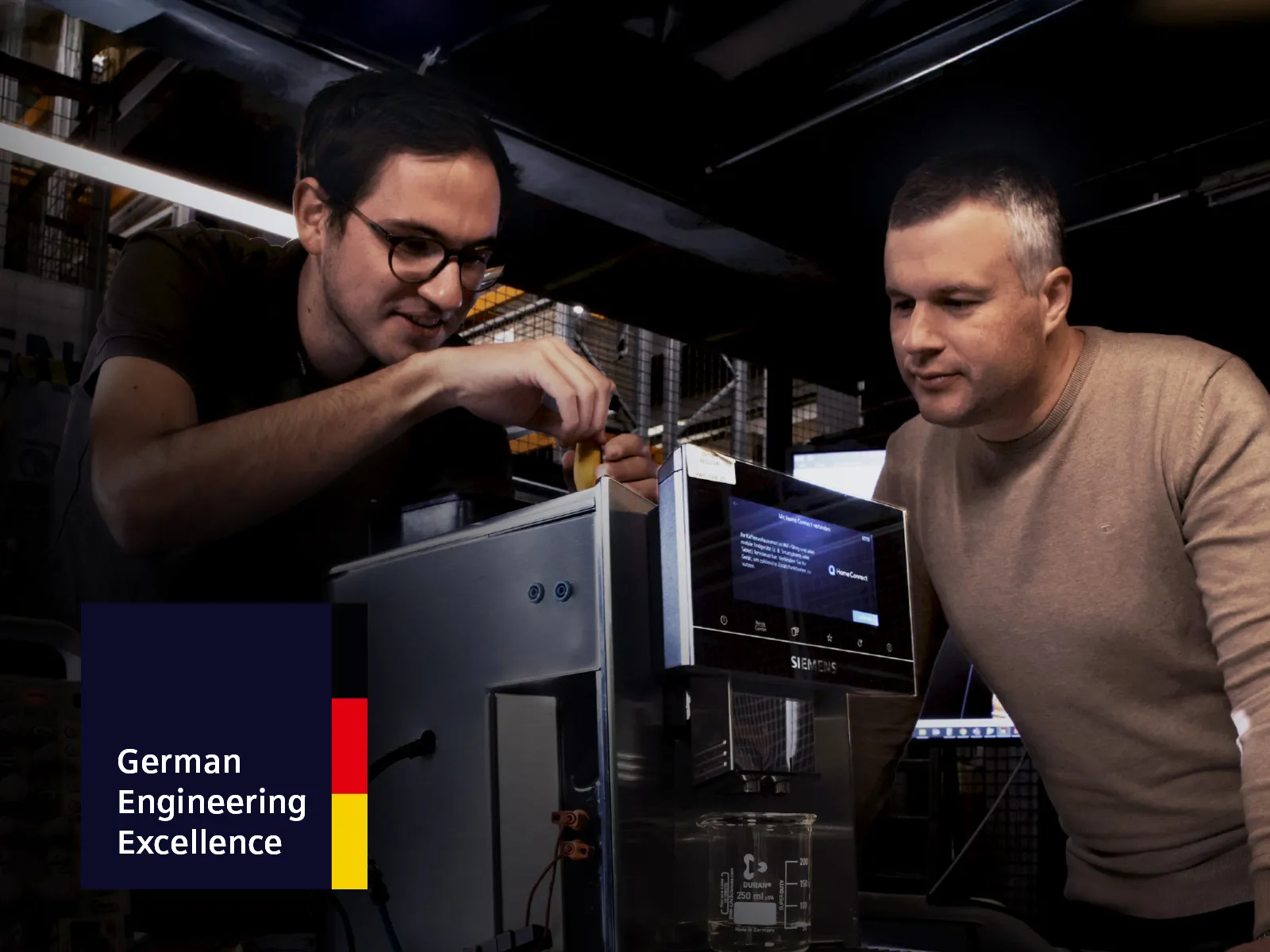 Siemens coffee machine being tested in a German engineering lab by a technician.