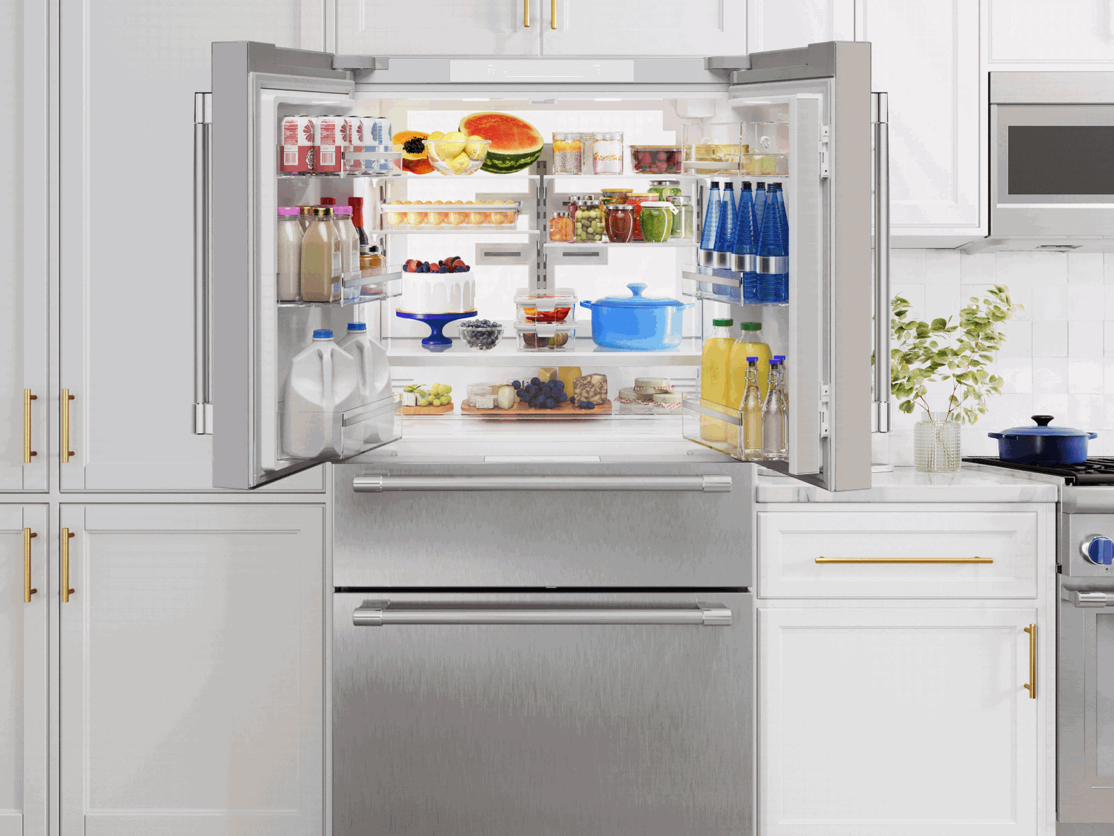 Open French door fridge, stocked with fresh food in a modern white kitchen.