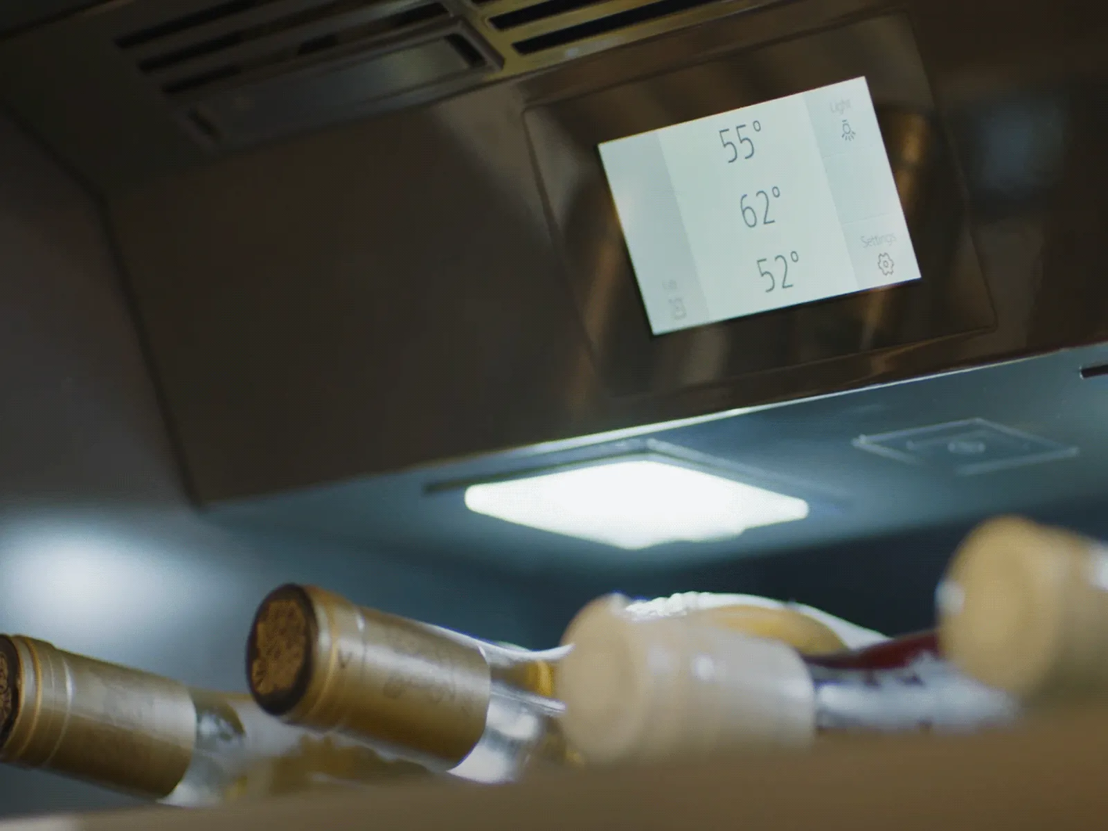 Bottles of wine inside a wine fridge