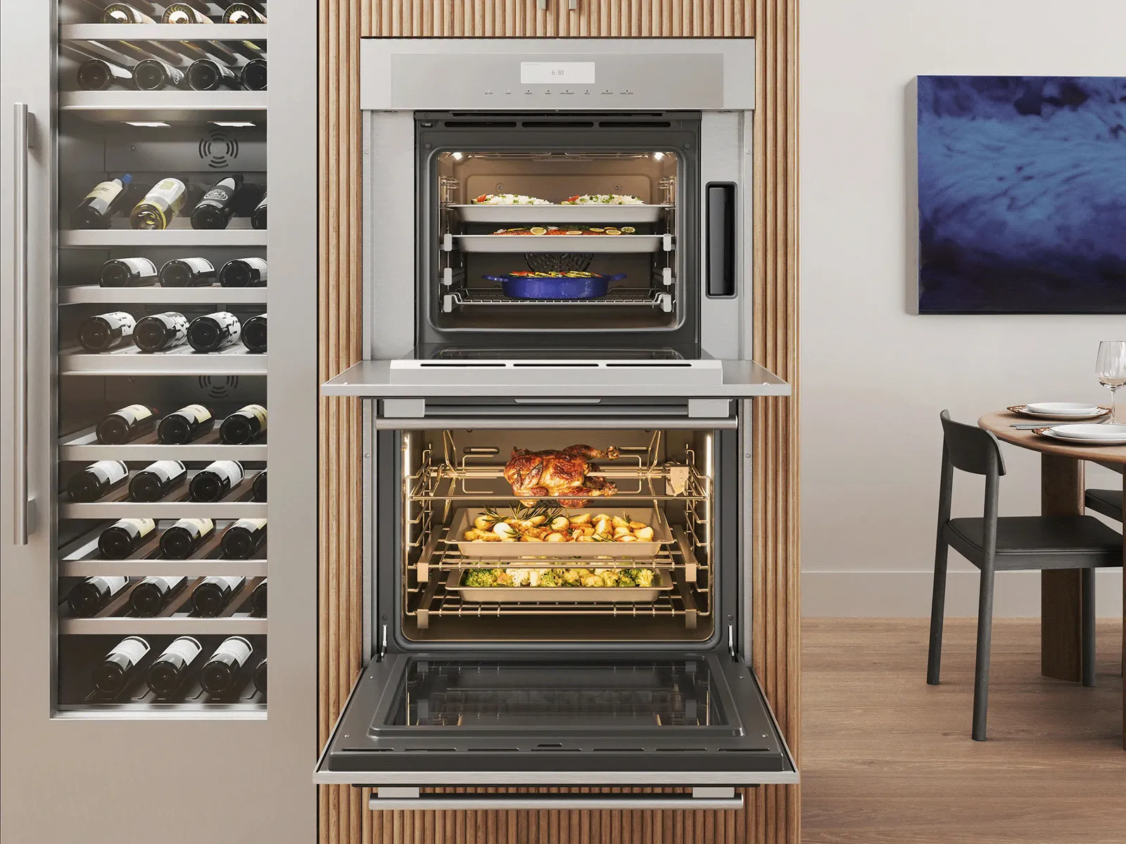 Stainless steel oven with an open door, a full meal roasting inside.