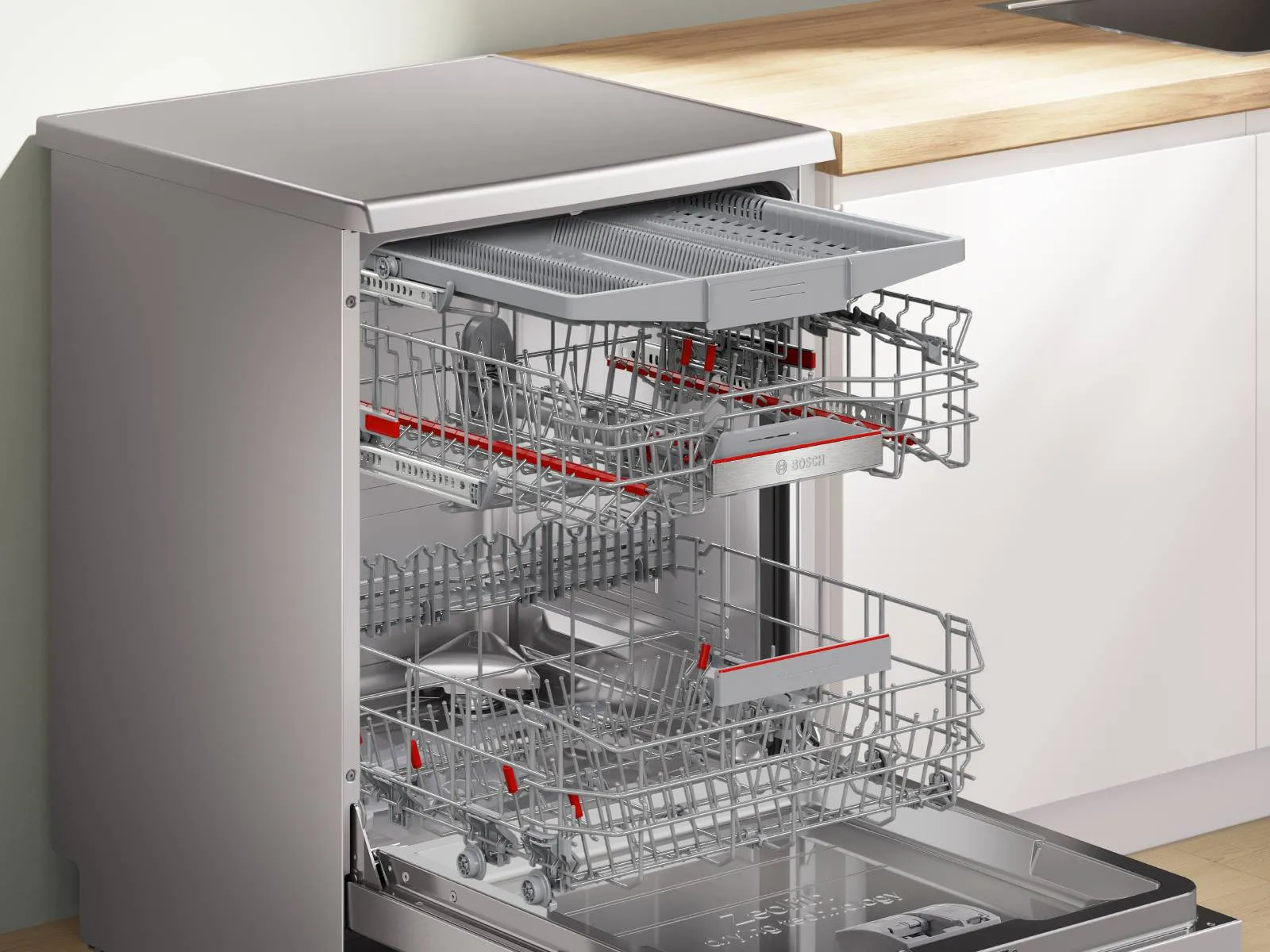 Open dishwasher with trays visible