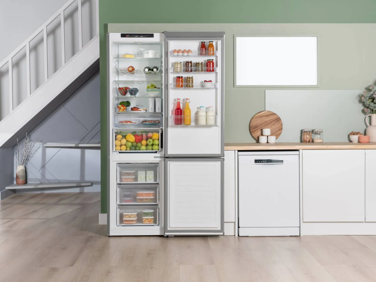Open fridge freezer in modern kitchen