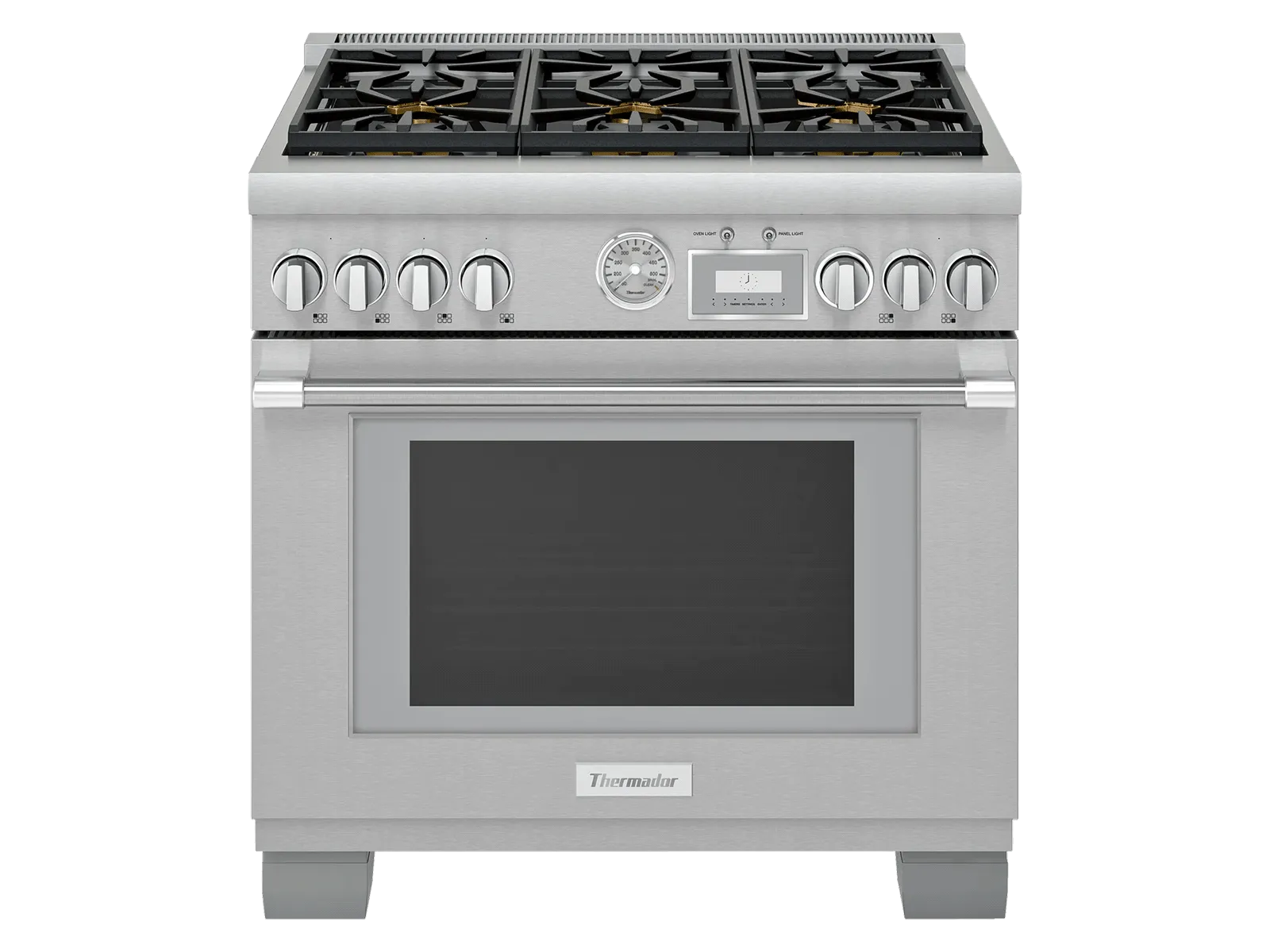 Front view of a stainless-steel professional freestanding range with a multi-burner gas cooktop featuring cast-iron grates and a rectangular griddle, a control panel with multiple stainless knobs, a central analog temperature gauge and small digital display, and a large oven door with a glass window and horizontal handle.