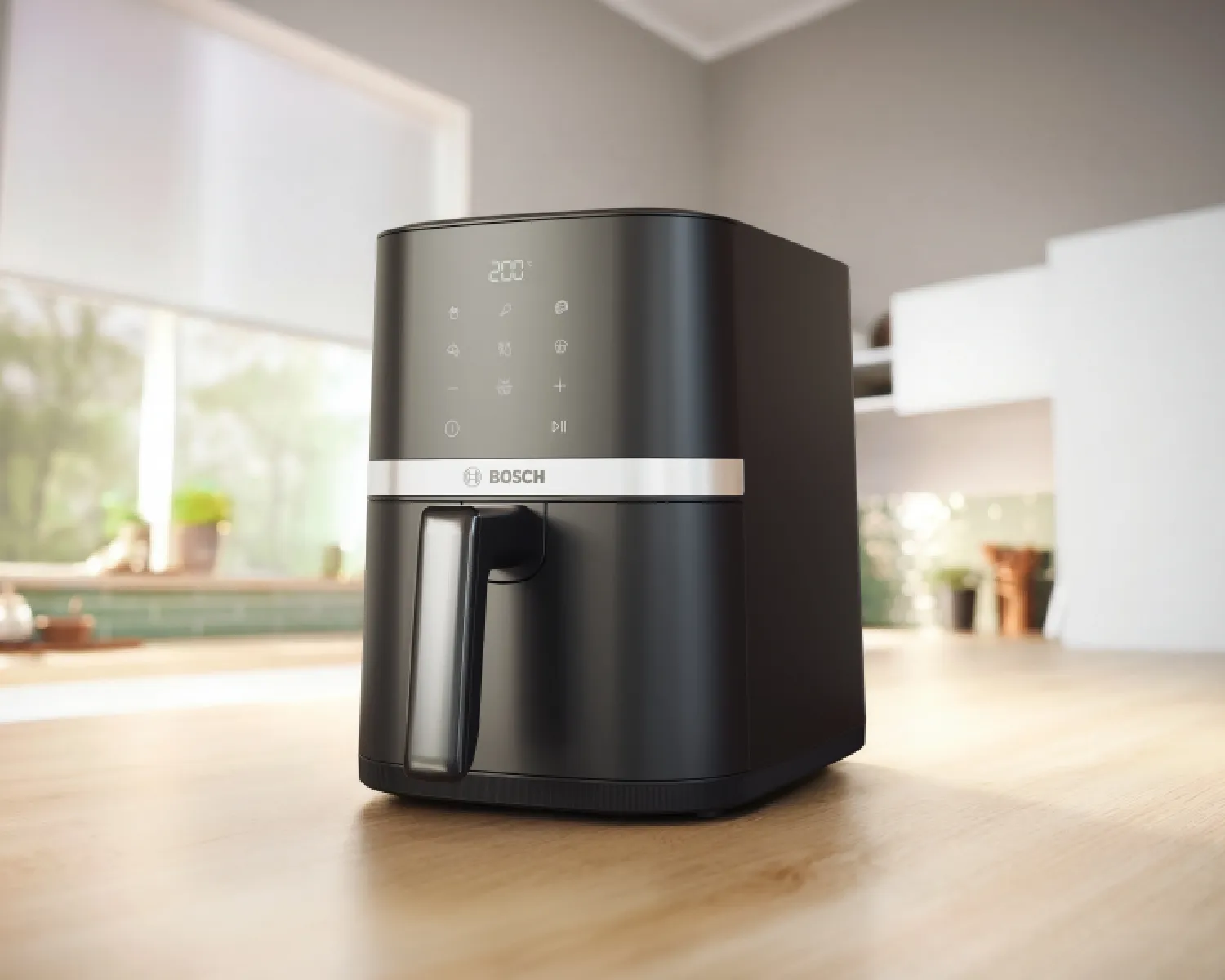 The Bosch Air Fryer Series 2 is placed on the kitchen island, in a sunlight, modern kitchen. 