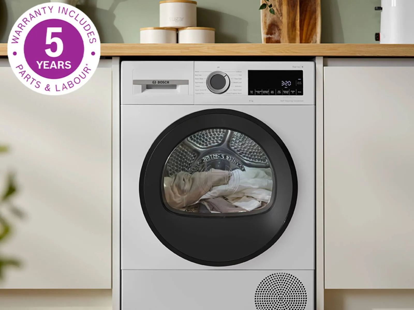 Under counter washing machine with 5 year warranty badge