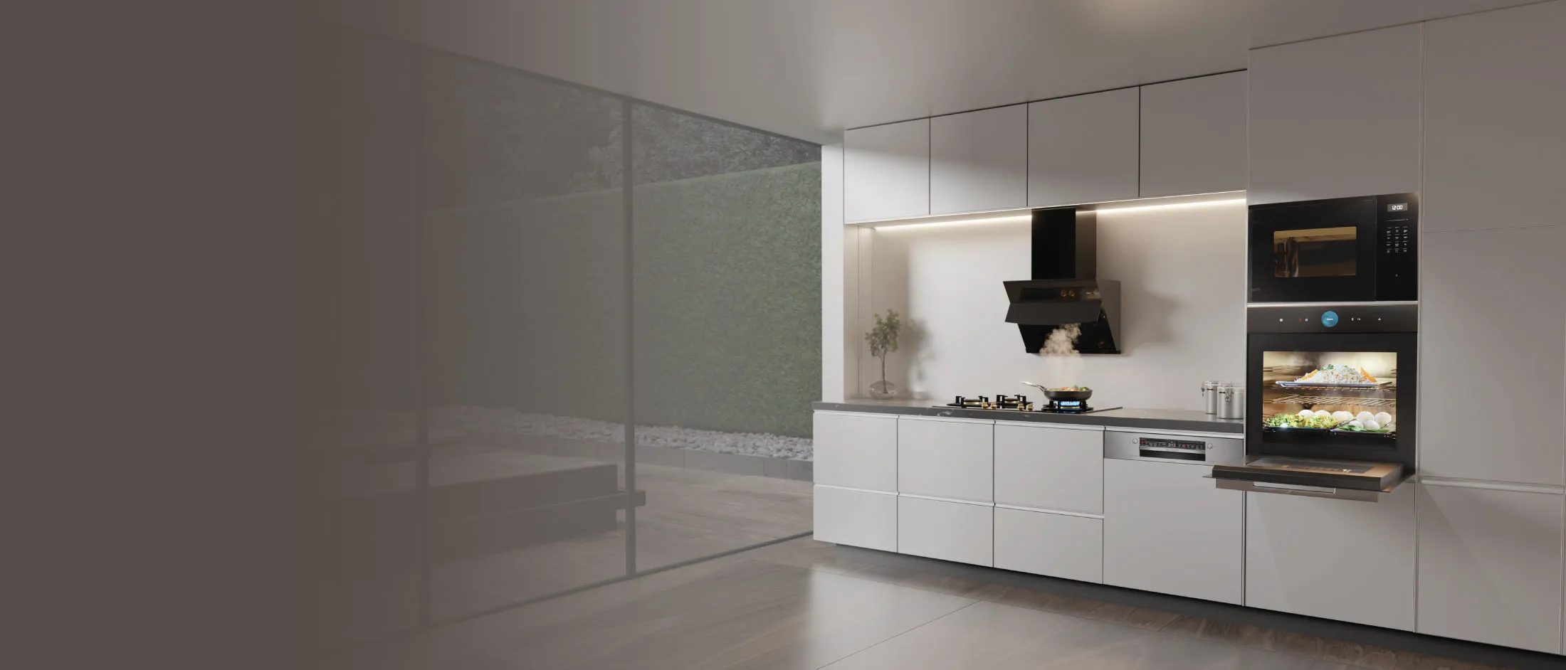 Sleek white kitchen with a black angled range hood over a steaming skillet, an open built-in oven with steaming trays, and floor-to-ceiling glass doors to a patio.