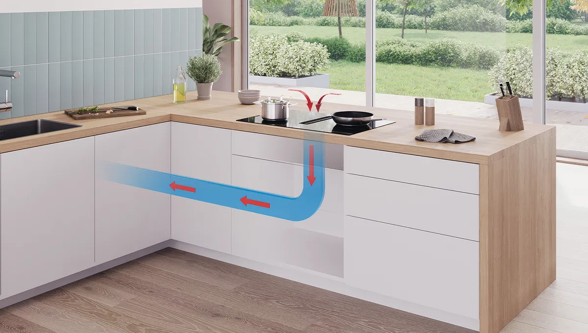 Encimera de inducción Bosch con extractor integrado. Las flechas rojas muestran el vapor de la cocción siendo aspirado hacia la corriente de aire azul.