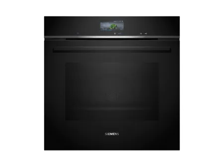 Black Siemens studioLine oven with a digital display showing a green vegetable dish and cooking settings.
