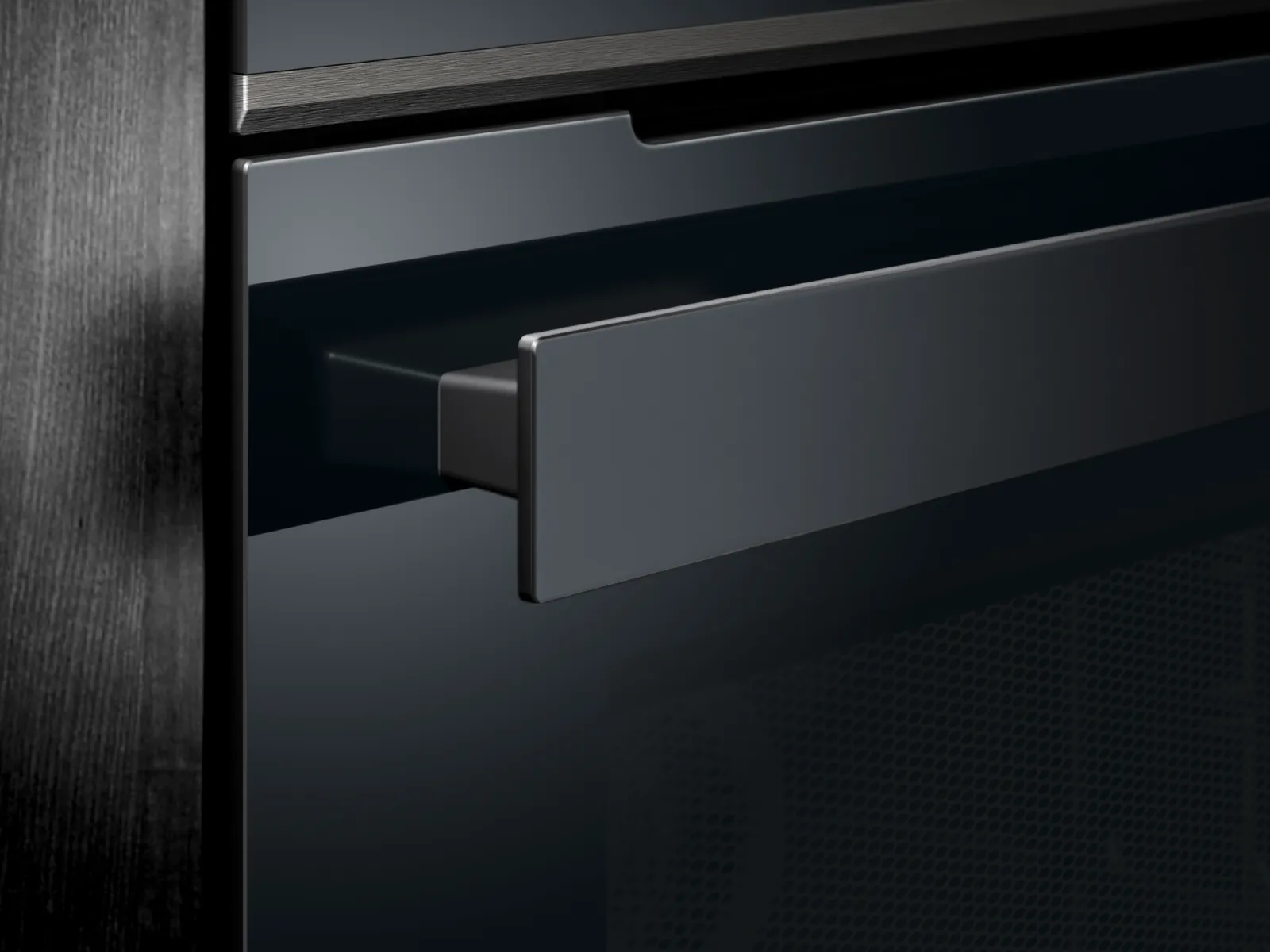 Vista laterale in primo piano della maniglia di un forno Siemens iQ700