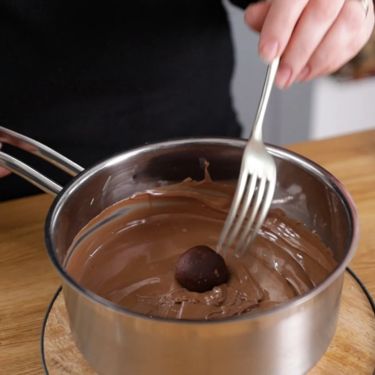 Coating mixture balls in melted chocolate