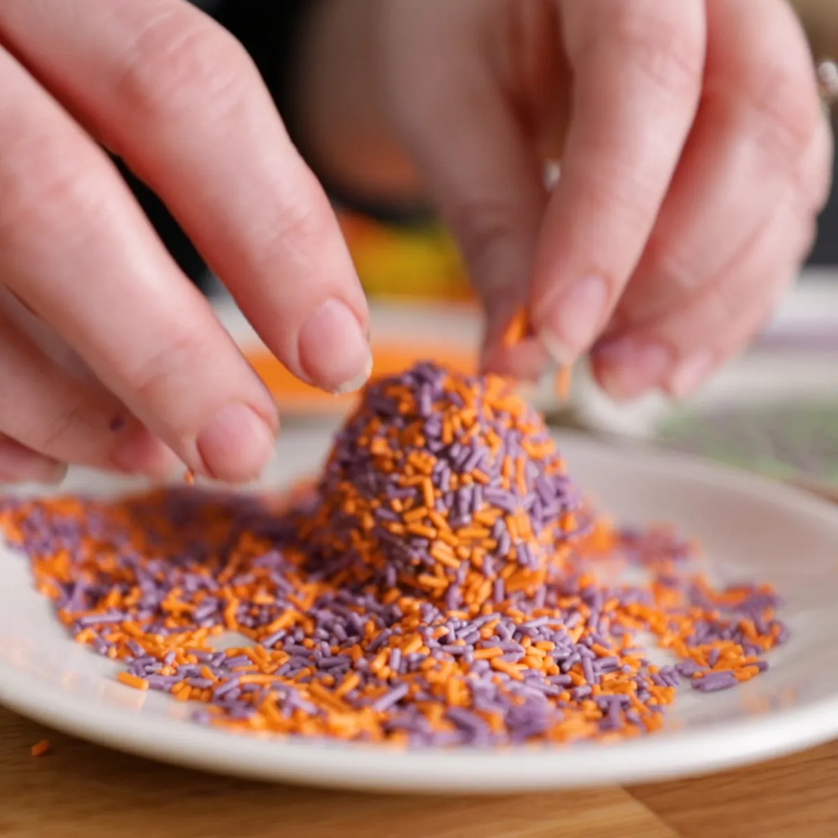Rolling mixture balls in sprinkles