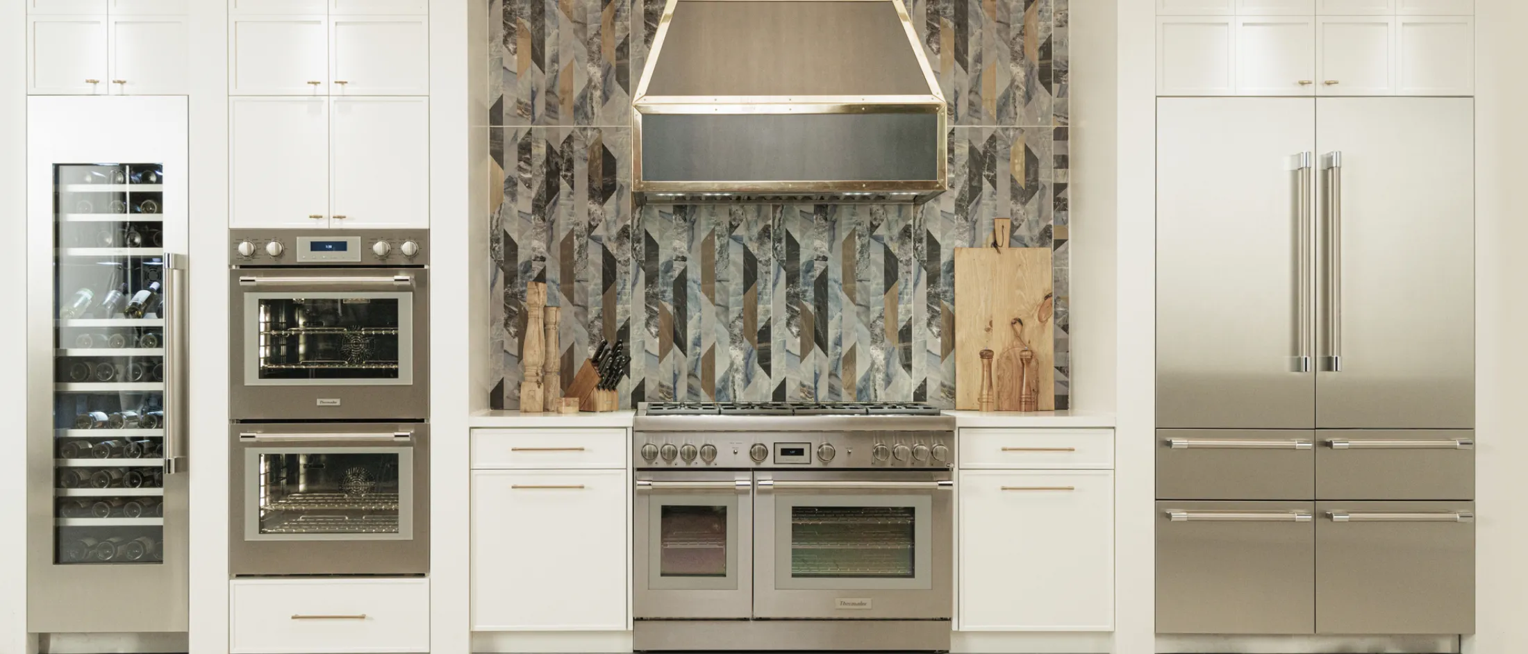 Thermador stainless steel luxury kitchen shot built-in white white cabinetry