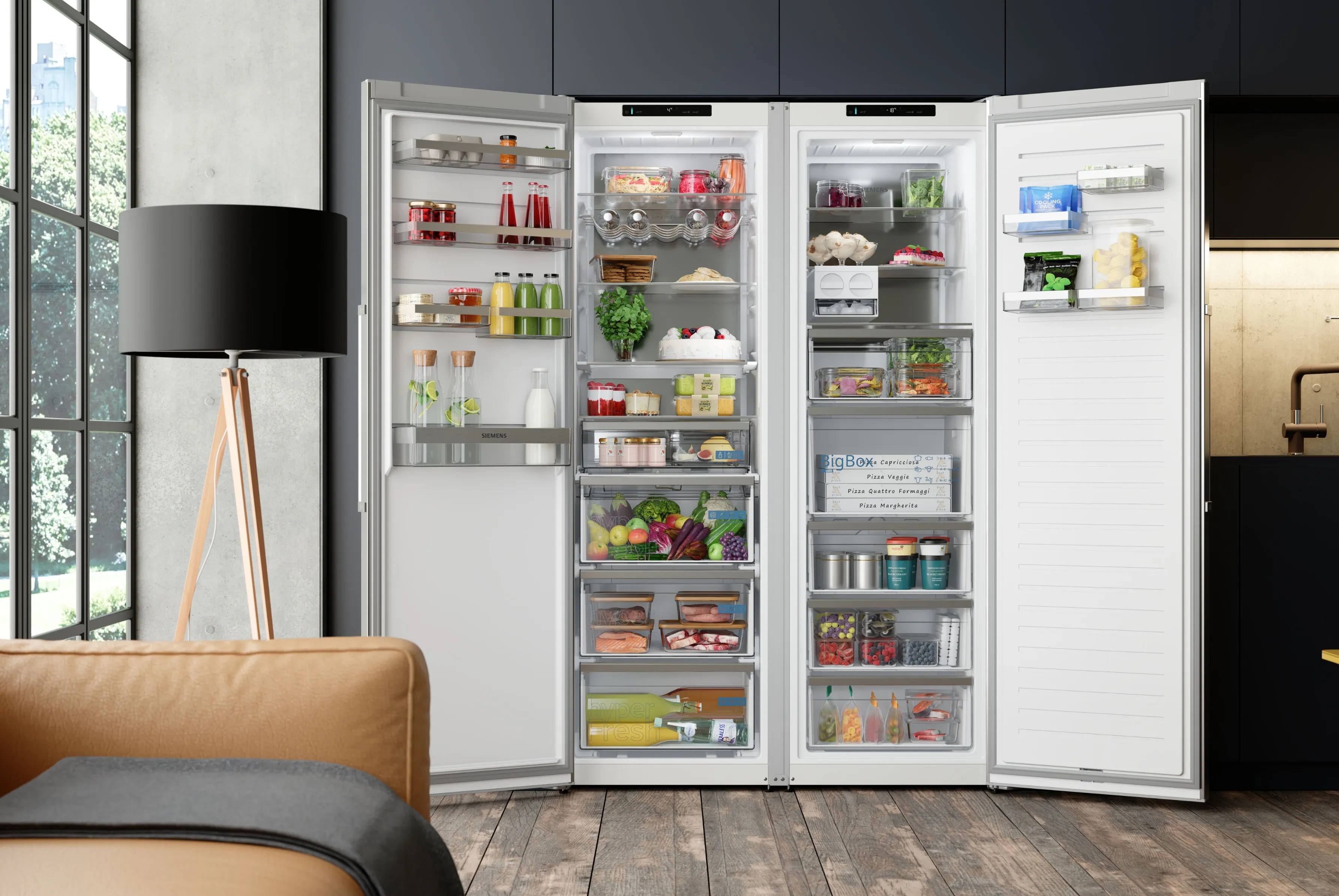 Espace de vie moderne avec un côté cuisine très design comportant en élément principal un réfrigérateurs-congélateurs side-by-side Siemens