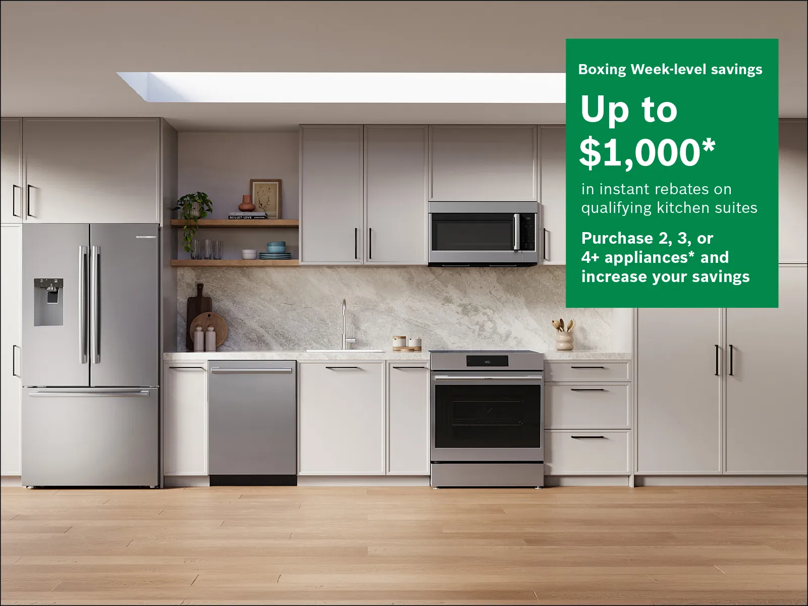 Modern kitchen with stainless steel fridge, dishwasher, oven, and microwave, featuring a Boxing Week sale sign with $1,000 savings offer.