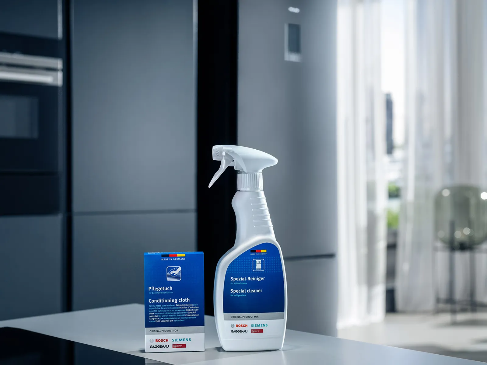 Cleaning supplies, spray bottle, and box on a table in a kitchen or bathroom setting.
