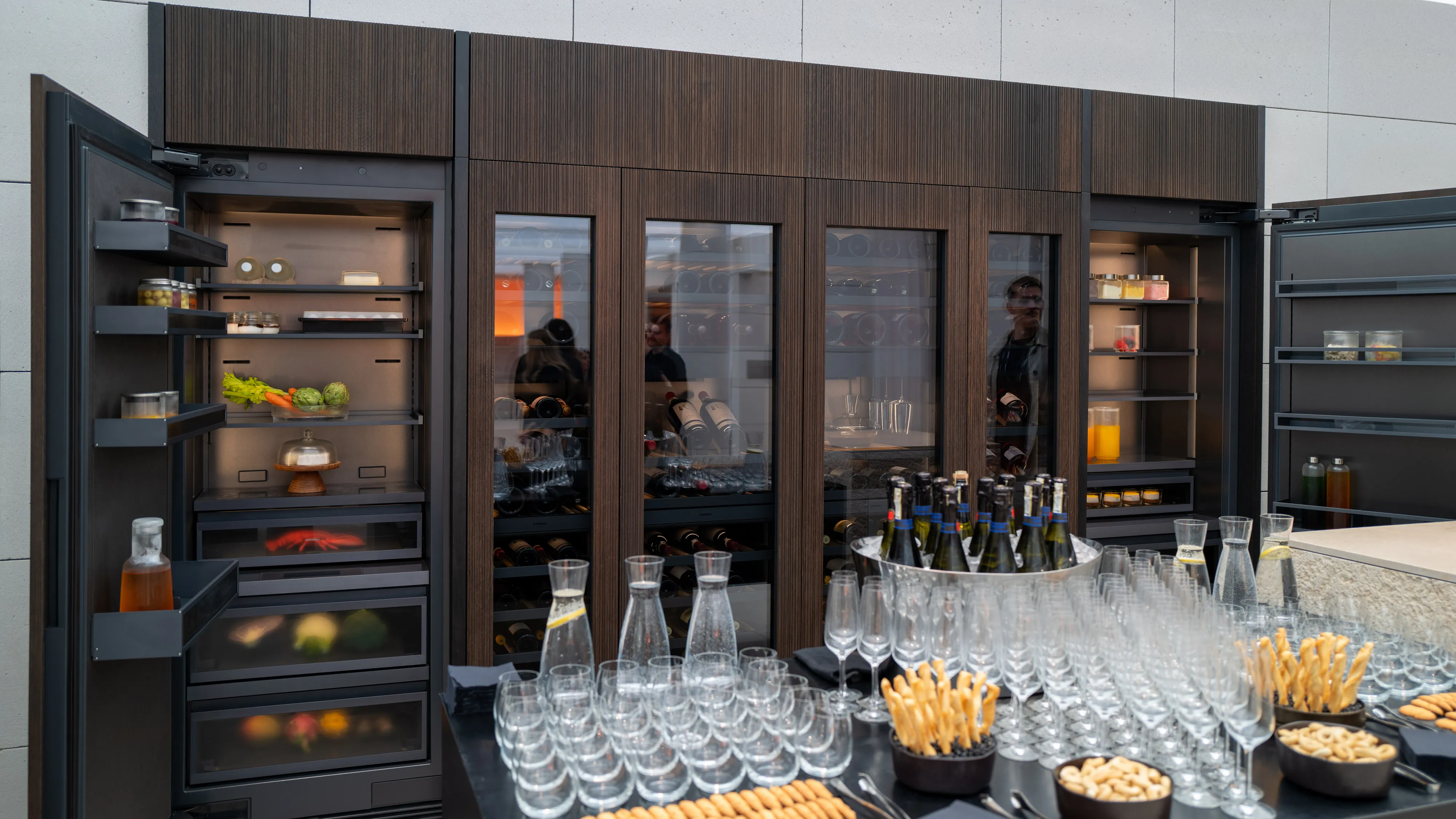 Guests at Gaggenau’s Salone exhibition admire the new Expressive Series cooling units.