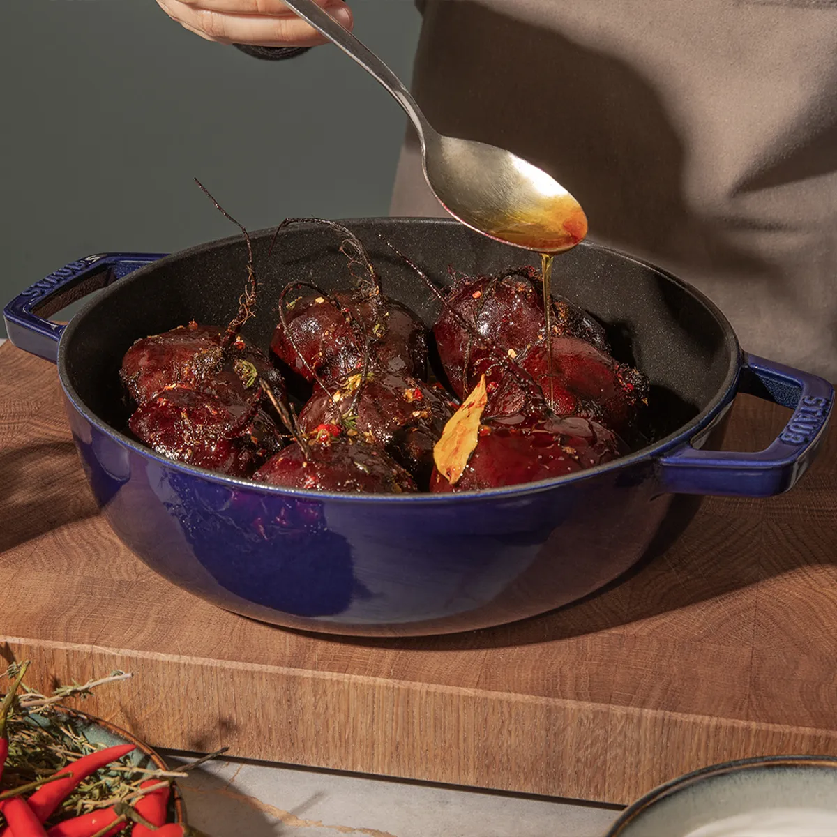 Delicious roasted beets glazed in a blue pot. Neff inspires vibrant, flavorful home cooking.