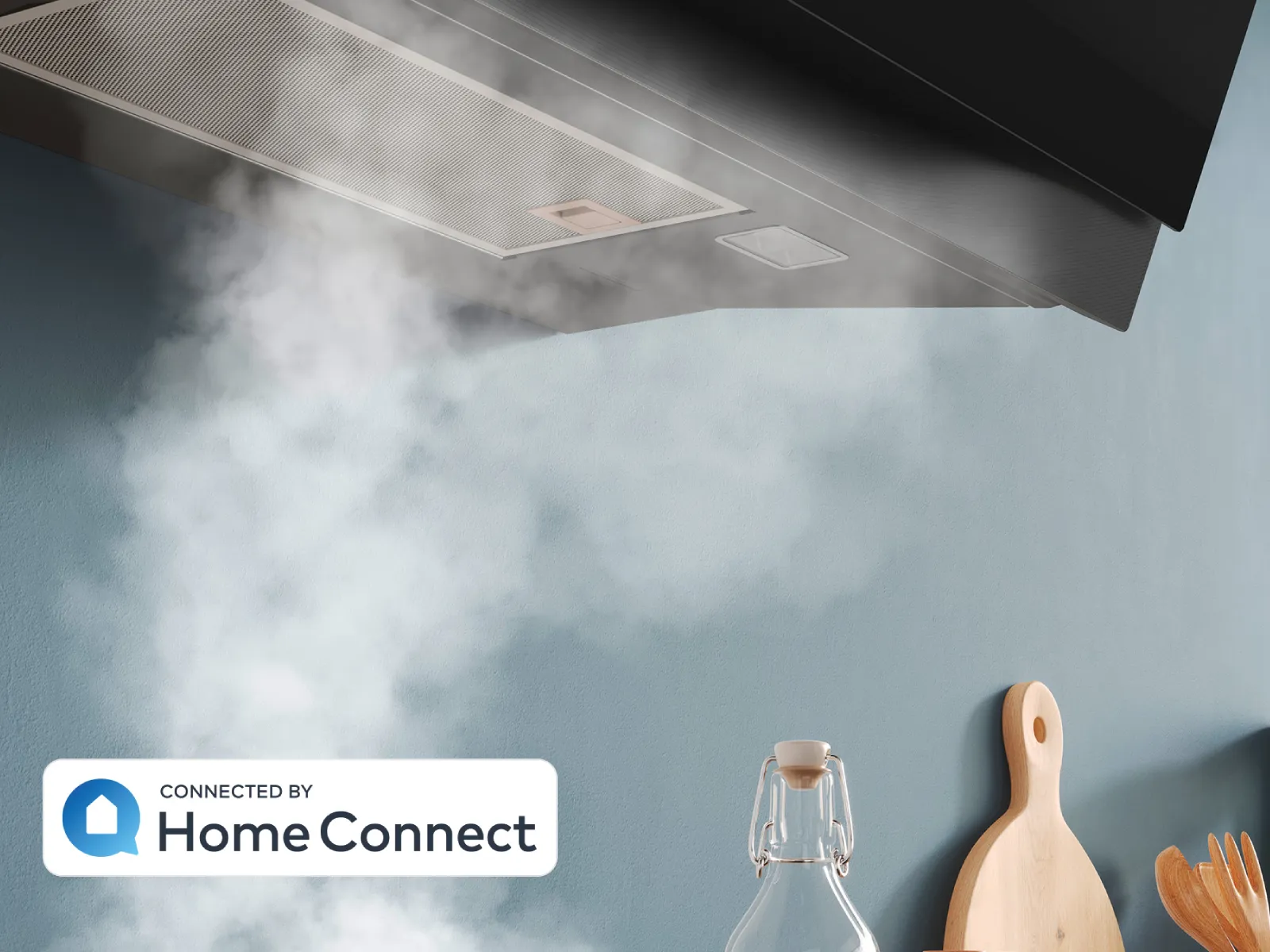 Kitchen appliances, cooking utensils, and a "Connected by HomeConnect" logo on a kitchen counter with steam rising.