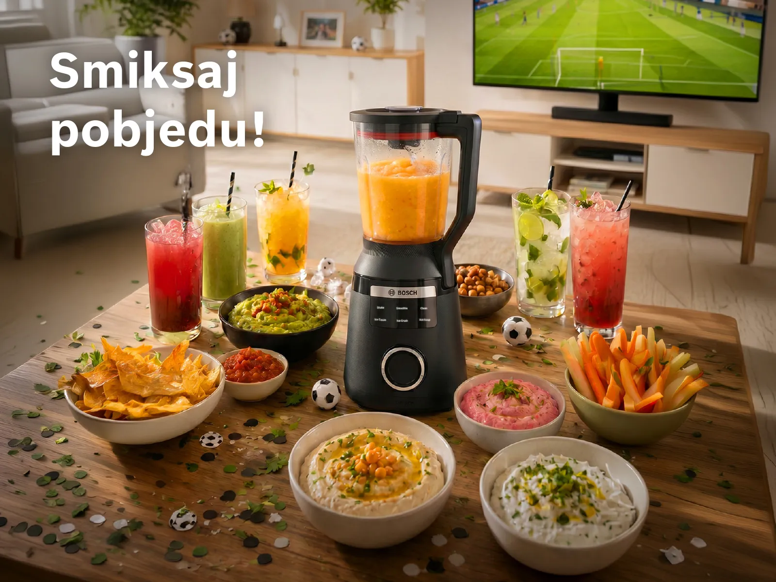 Bosch blender na stolu s pripremljenom hranom za navijanje.