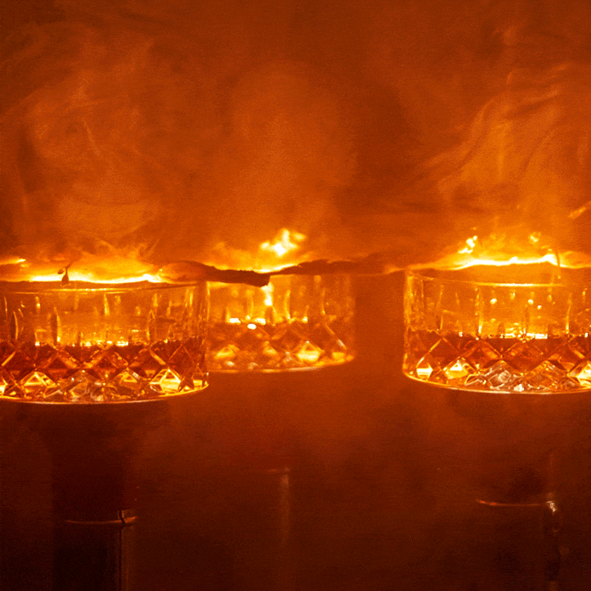 Gif with 3 cocktails with a huge bright and smoke