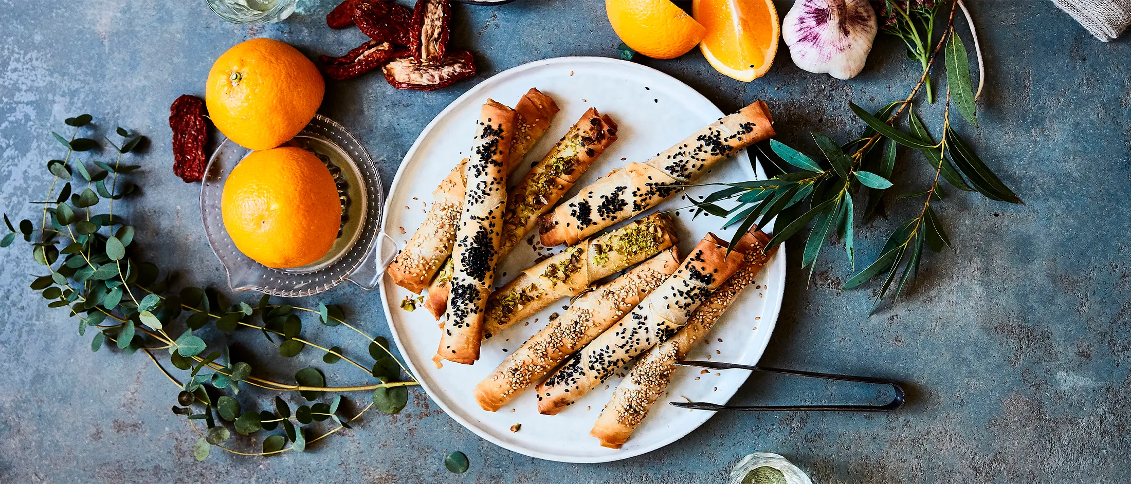 Pastry cigars with orange carrot dip