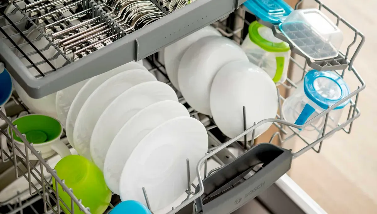 Bosch dishwasher open with clean and dry dishes