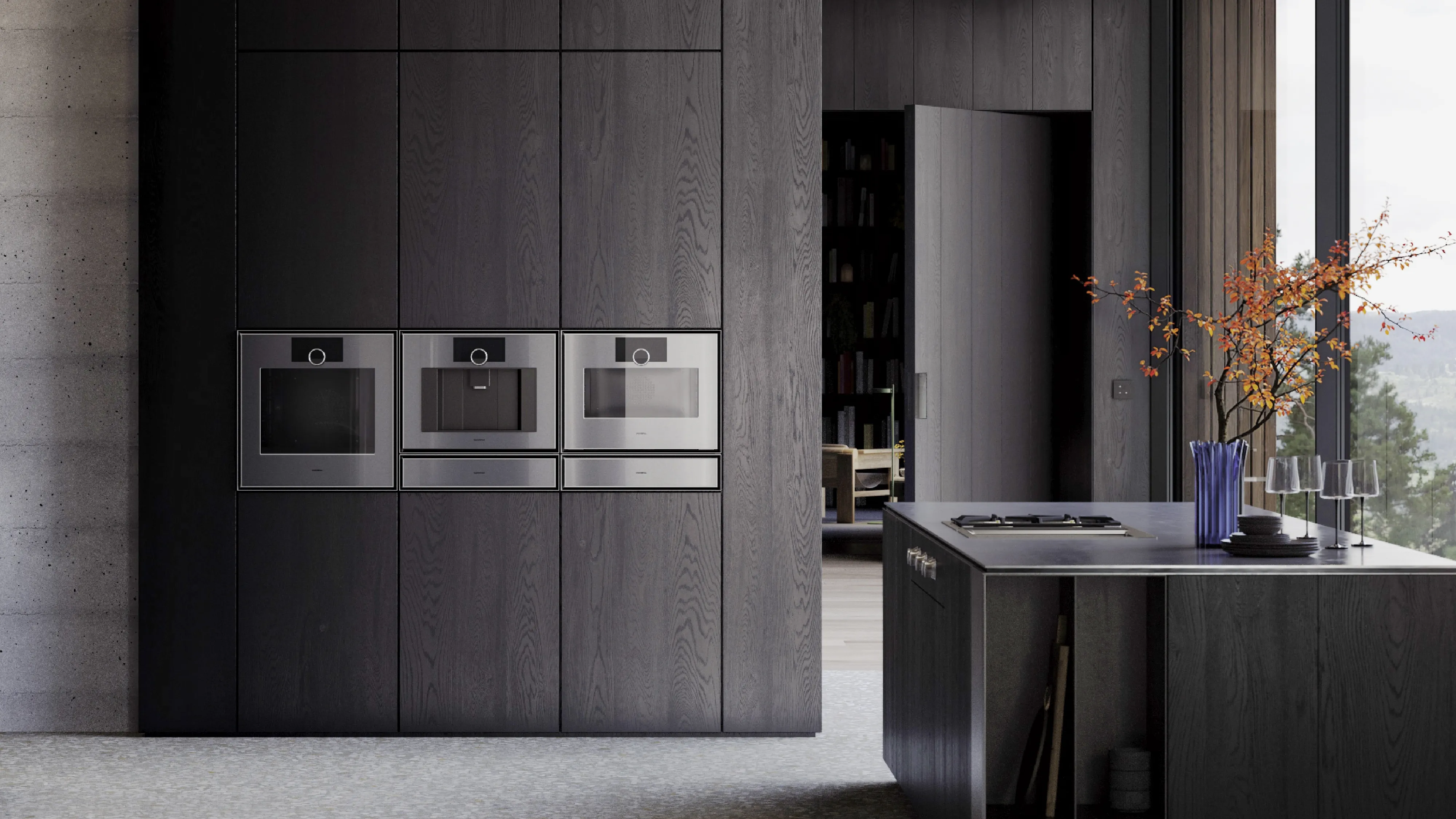 View into an open plan luxury kitchen fitted with Gaggenau Expressive series appliances