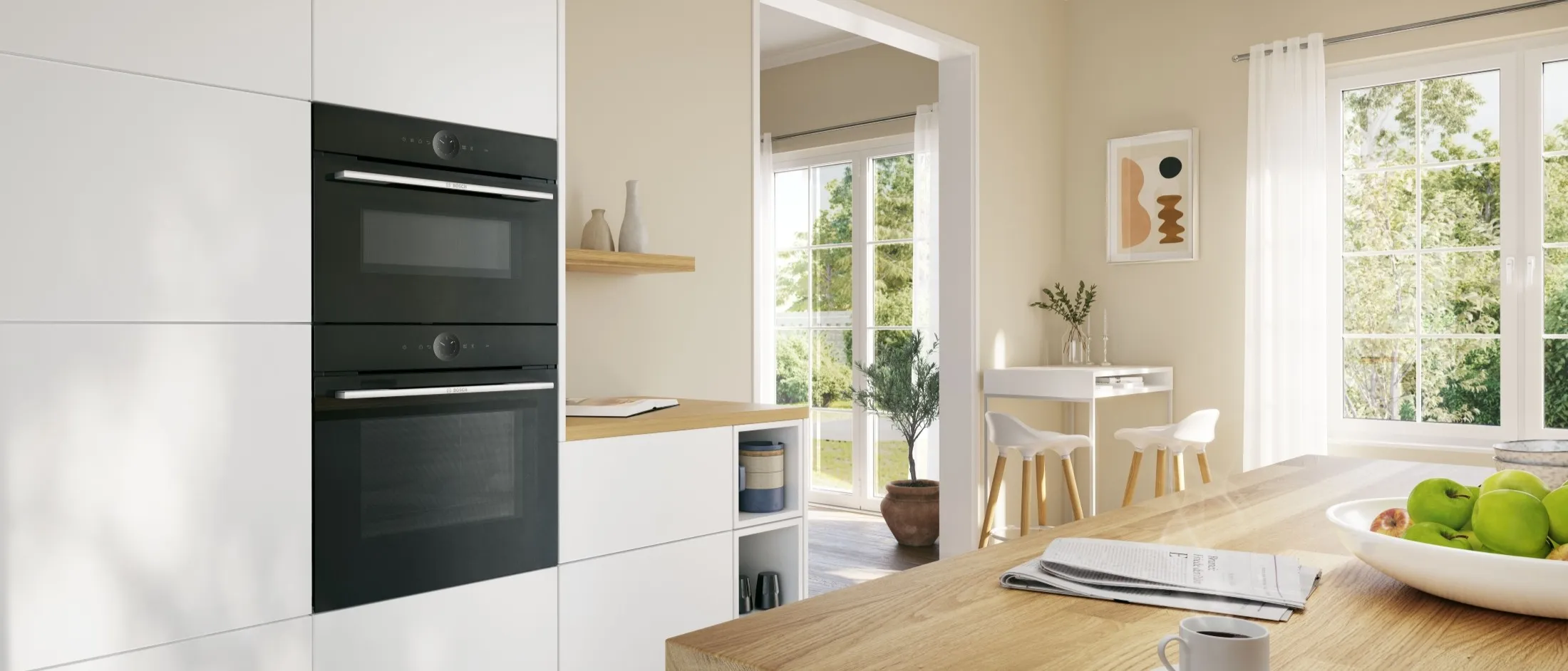 Bright open kitchen with two Bosch built in cooking appliances in cabinet
