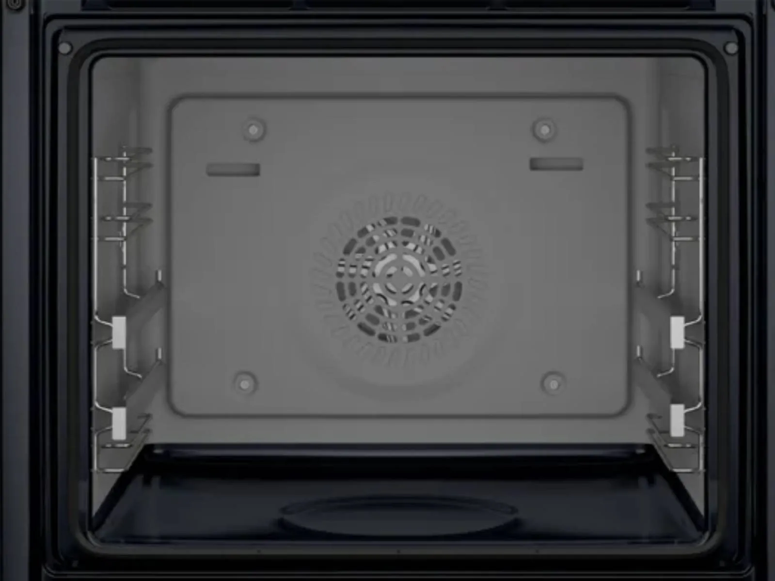 Interior view of a modern black Bosch oven, showcasing a spacious cavity with racks on each side and a central fan for even cooking.