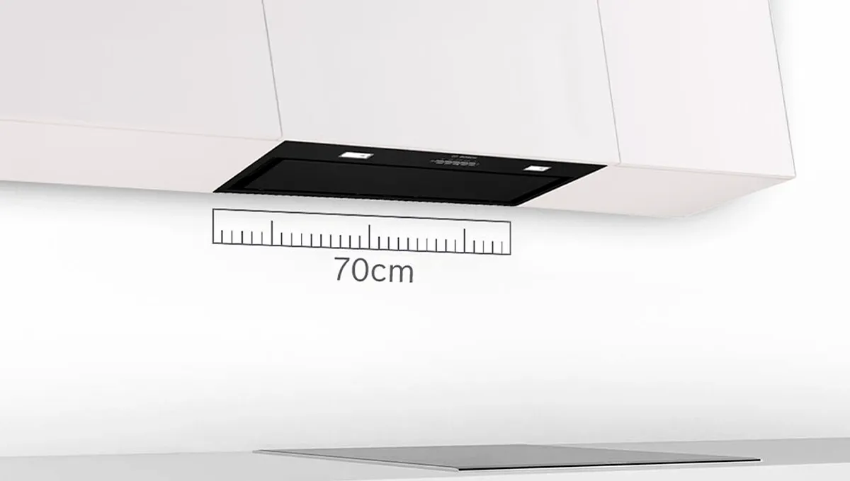 White kitchen range hood with LED lights, showing a 70 cm width measurement above a stovetop.