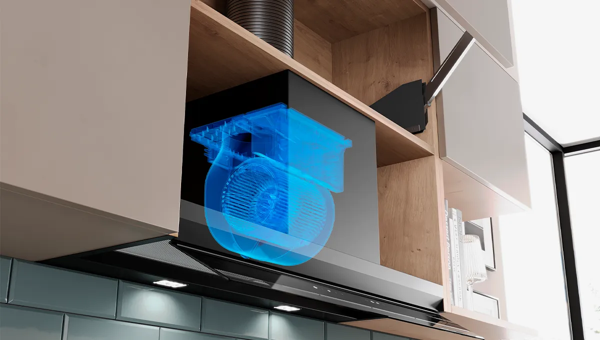 Ventola di estrazione da cucina integrata in un mobile, che mostra il motore evidenziato in sovrimpressione blu.