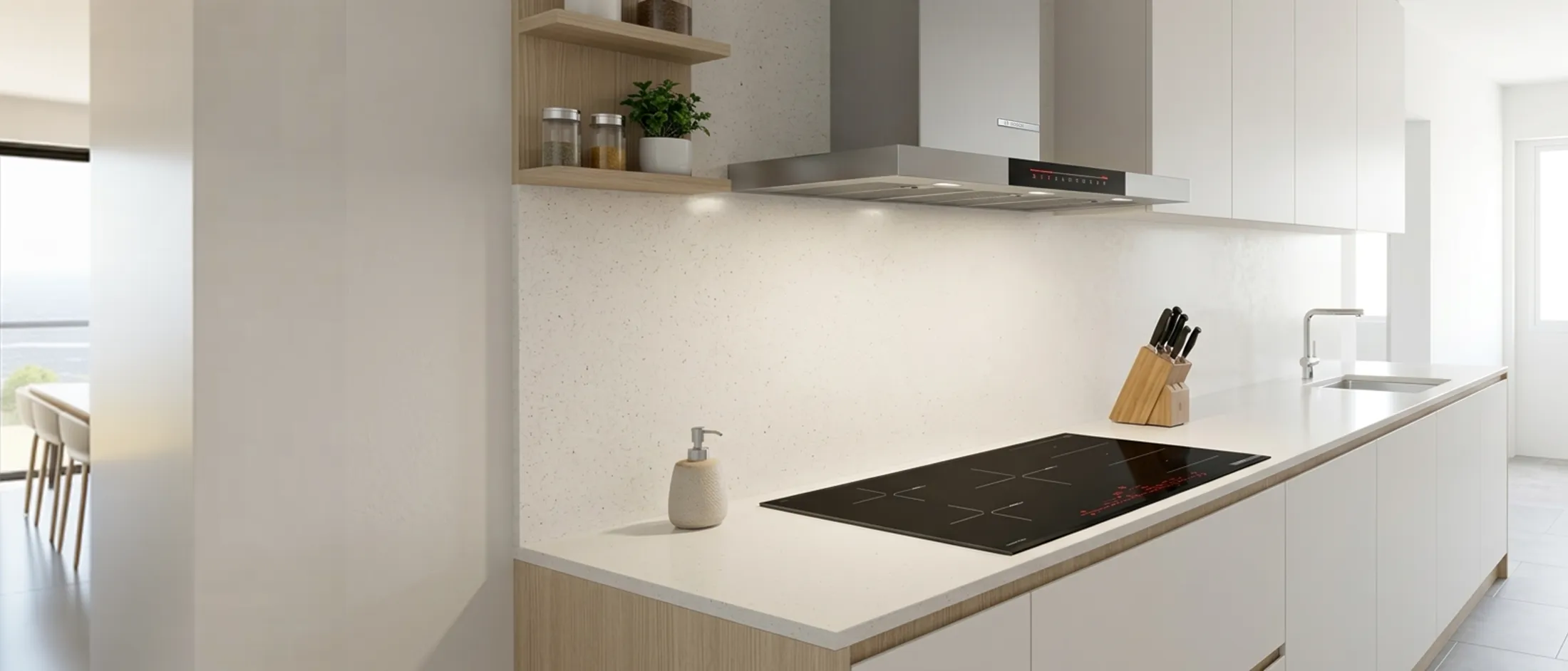 Modern kitchen with a Bosch built-in oven, minimalist wooden cabinetry, and wide induction hob on the island.